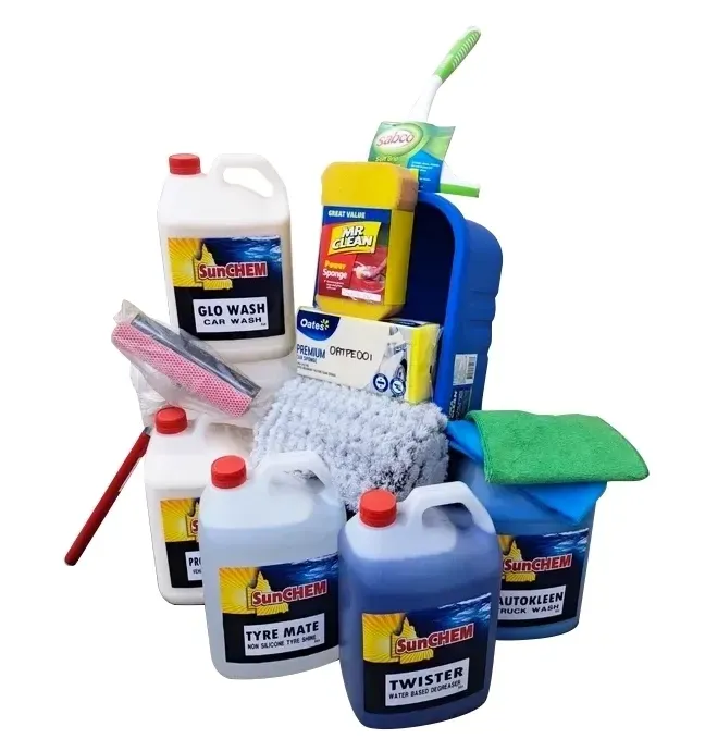 A pile of car wash cleaning chemicals and sponges— Sunchem Quality Cleaning Products In Gympie, QLD