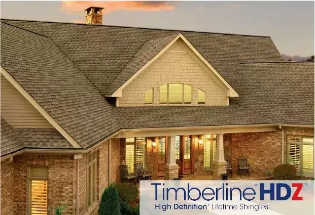 House roof with gray shingles and Timberline HDZ logo at bottom right