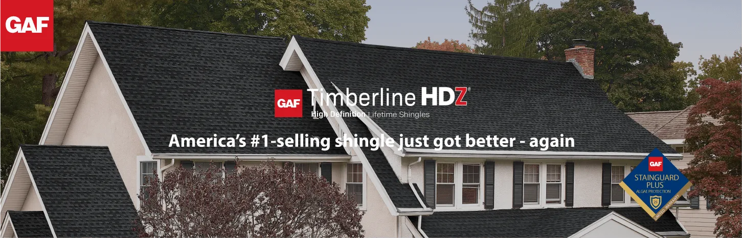 GAF roofing ad on a house with dark gray shingles and white text about Timberline HD shingles.
