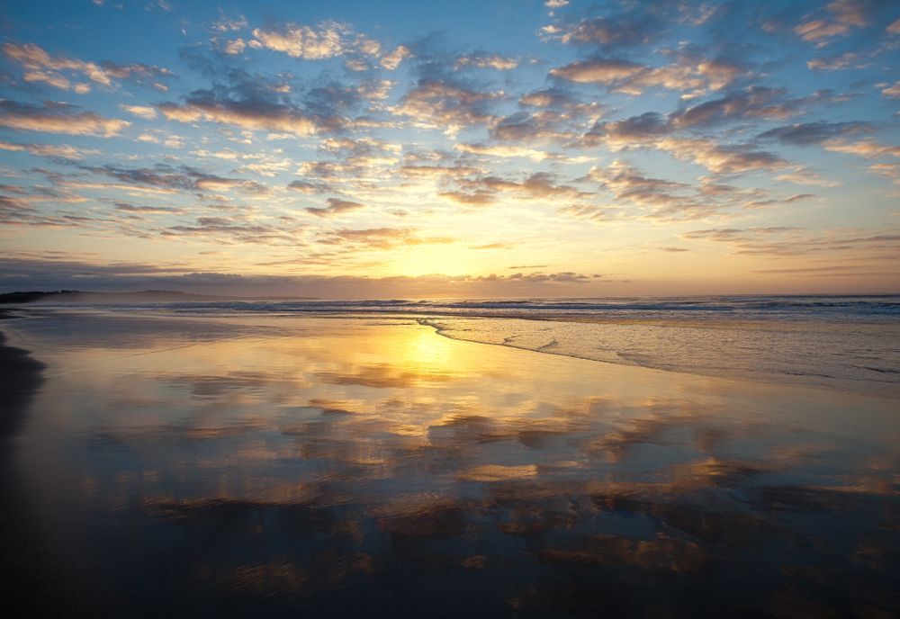 Scenic View Of A Colourful Sunset Over A Serene Lake, Creating A Peaceful And Tranquil Atmosphere — Sydney Underfloor Heating in Woonona, NSW