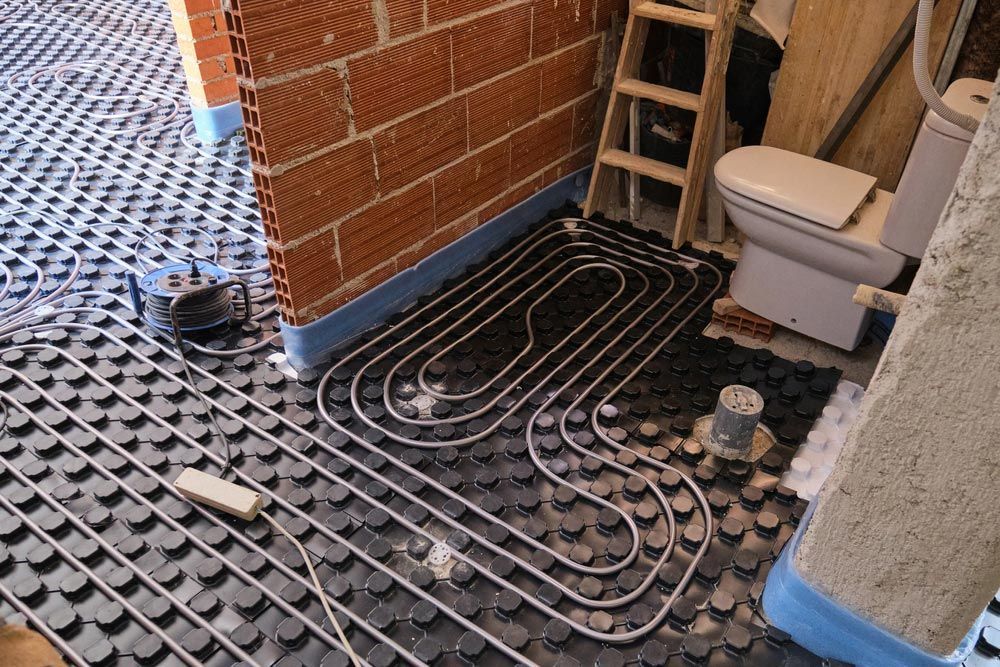 Radiant Underfloor Heating Installation In A Bathroom — Sydney Underfloor Heating in Woonona, NSW