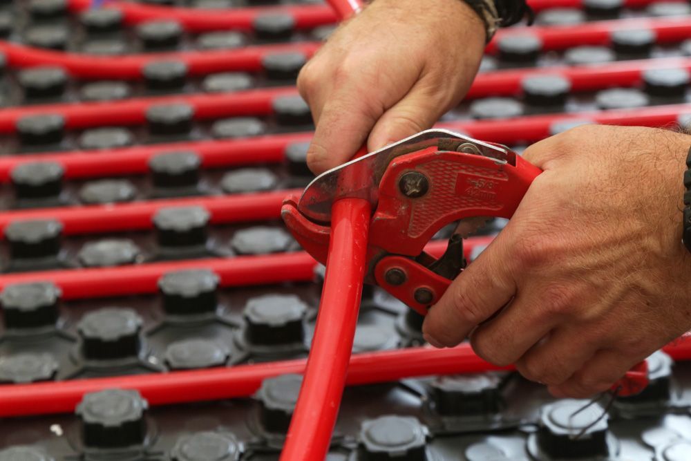 Cutting the Wire of  Underfloor Heating System — Sydney Underfloor Heating in Illawarra, NSW