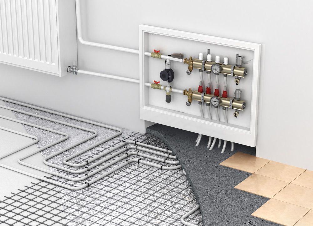 Underfloor Heating With Collector And Radiator In The Room — Sydney Underfloor Heating in Woonona, NSW