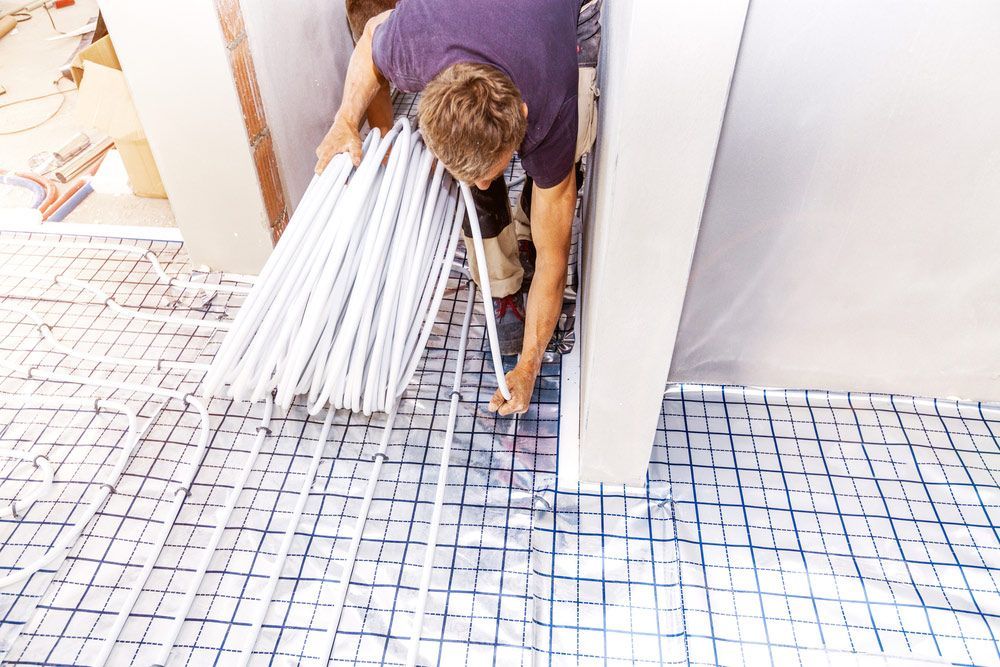 Pipe Fitter Mounted Underfloor Heating — Sydney Underfloor Heating in Woonona, NSW