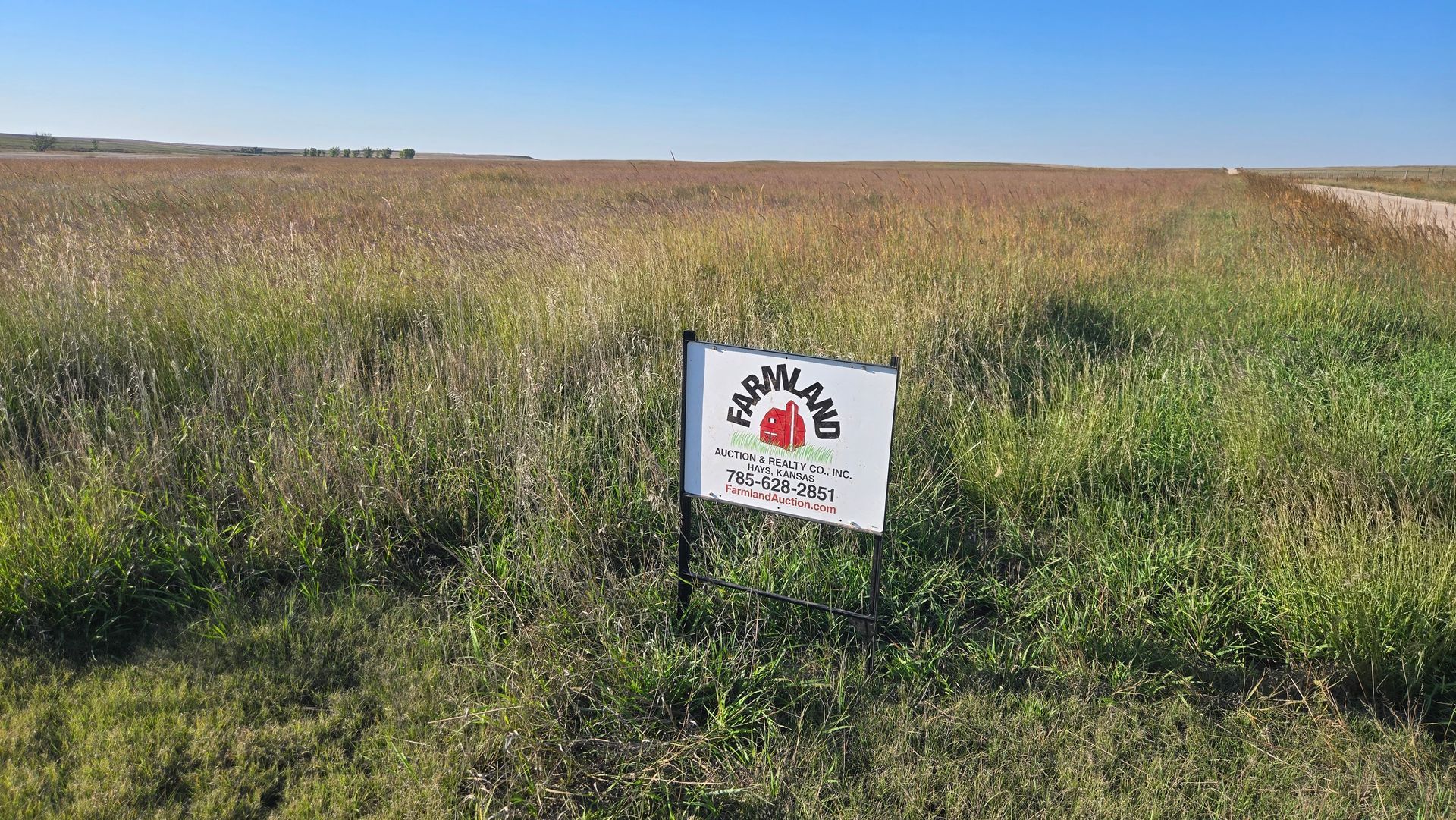 A sign that says for sale private treaty on it