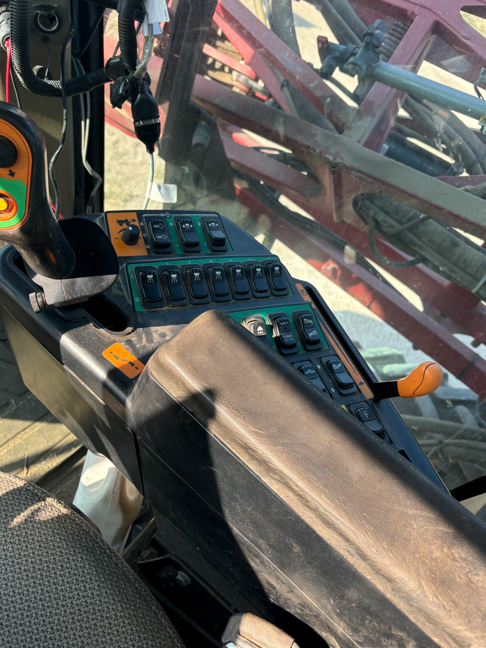 A close up of the cockpit of a tractor.