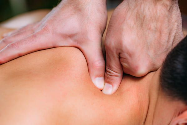 the physiotherapy process in action on a patients neck