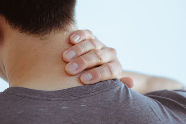 man with whiplash injury