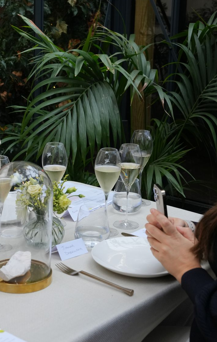 Champagne Jacquart launch guests dining The Greenhouses REGO Creative