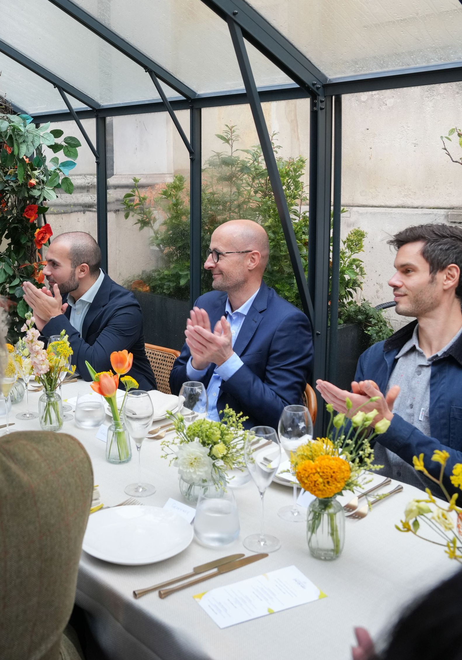 Guests applauding Champagne Jacquart UK launch event REGO Creative