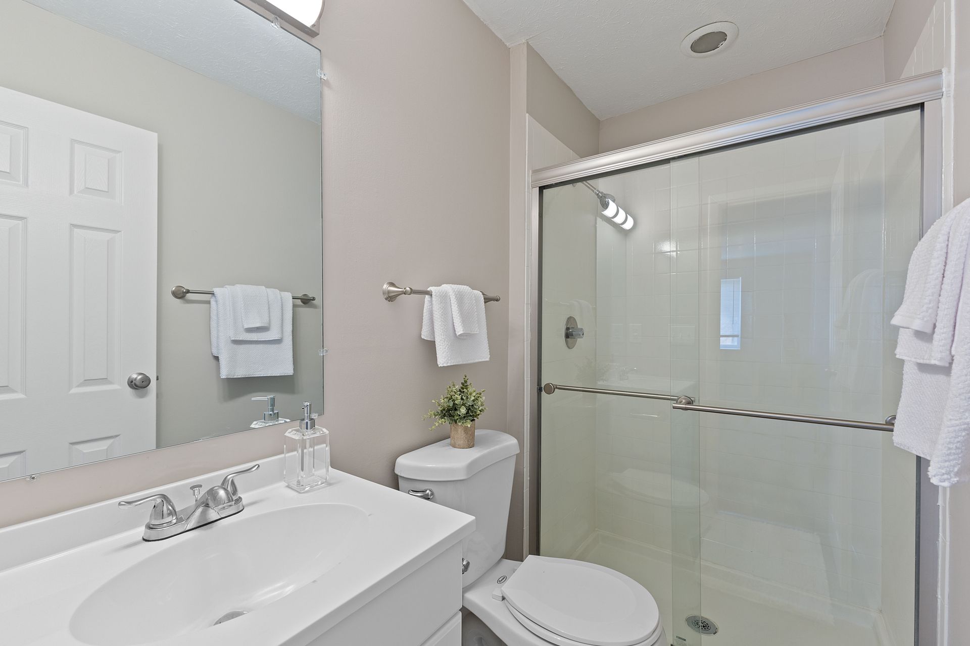 a photo of a renovated bathroom at The Wimbledons