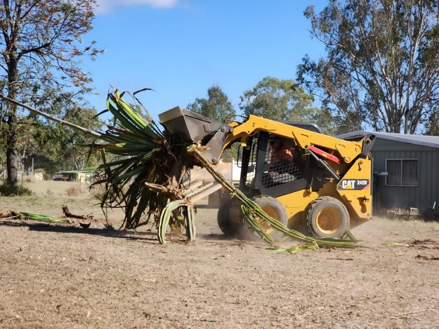 A Bulldozer Is Cleaning Property — Greenslade's Dozer & Excavator Hire Pty Ltd In Taabinga, QLD