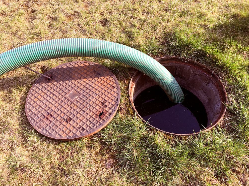 Septic Tank Being Pumped Out — Raptor Waste Management In Ormeau, QLD