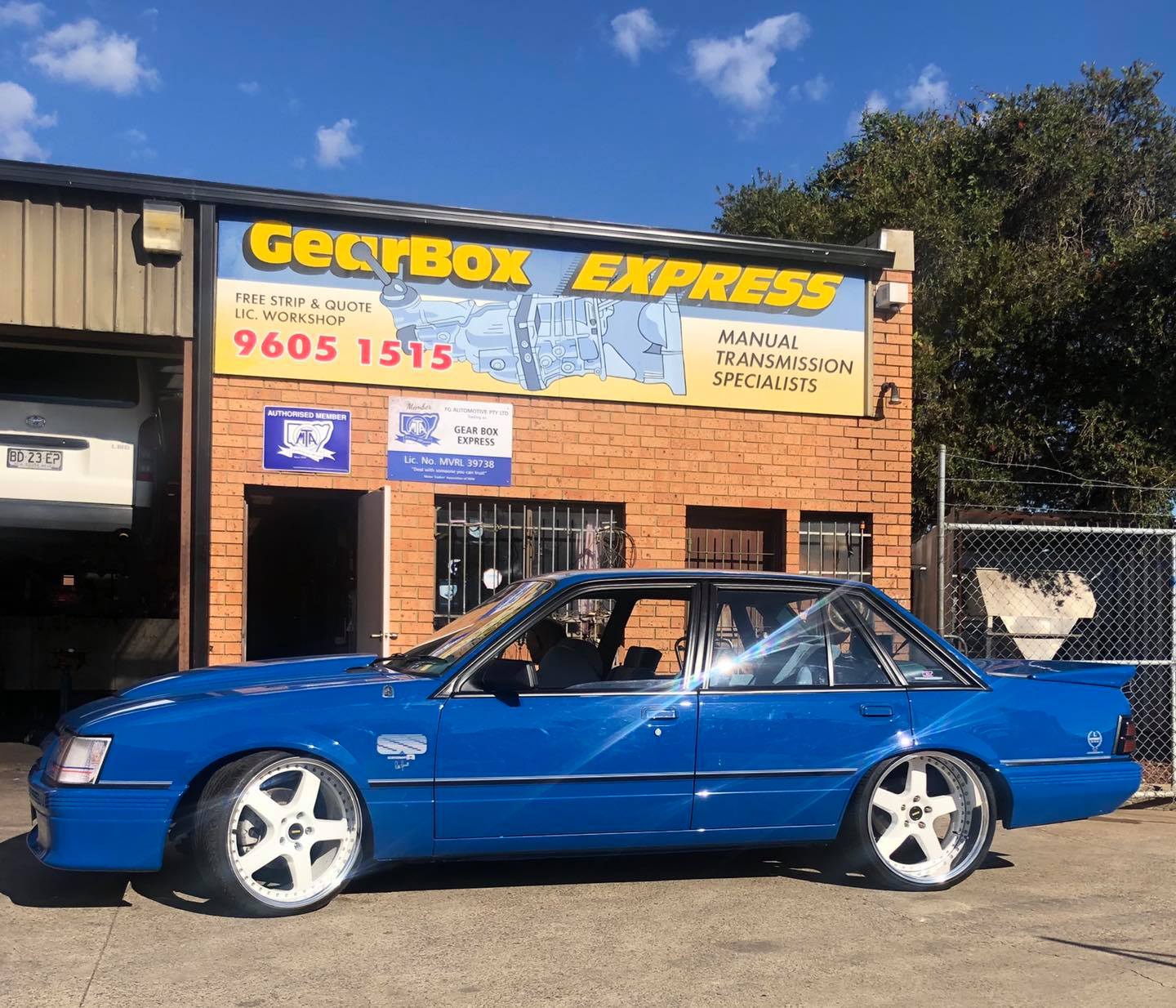 Blue car with white rims | Ingleburn, NSW | Gearbox Express