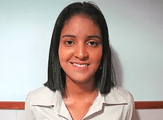 A young woman is smiling for the camera while wearing a white shirt. LUZMARIA DEL CARMEN HURTADO MENDOZA