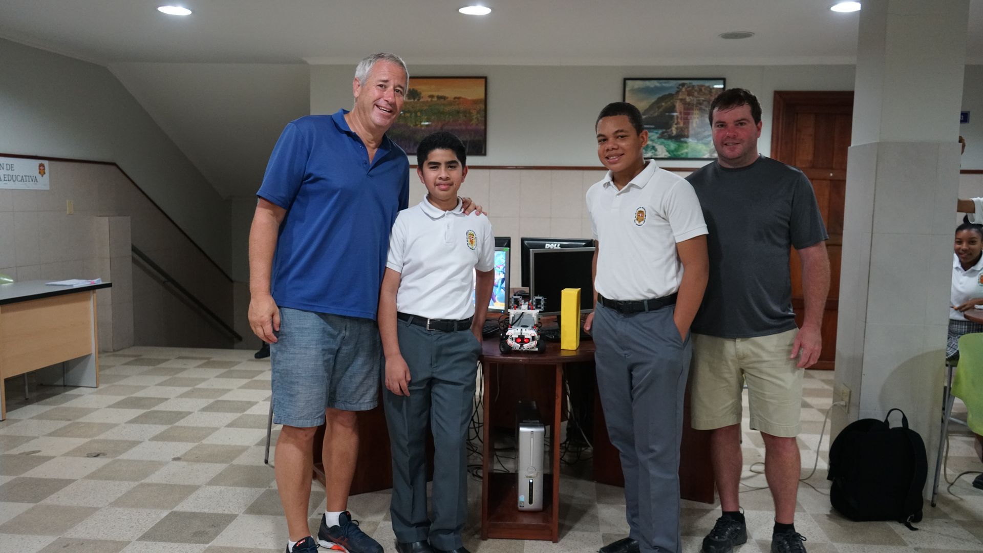 Students with andy stein in computer room.  orphaned starfish foundation  andy stein OSF Robotics Initiative stem education.