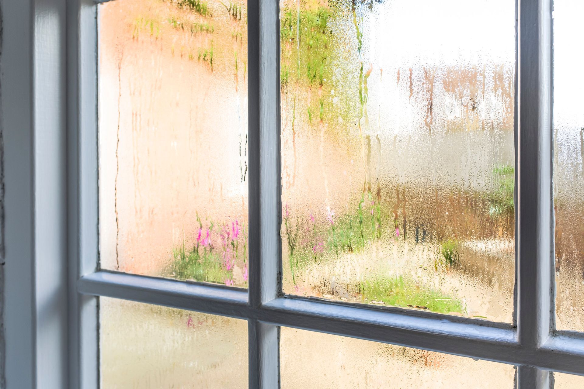 a window covered in humidity