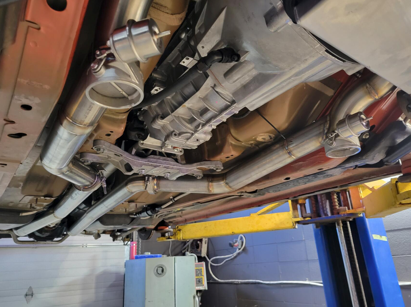 custom tig exhaust with vacuum acuated dumps