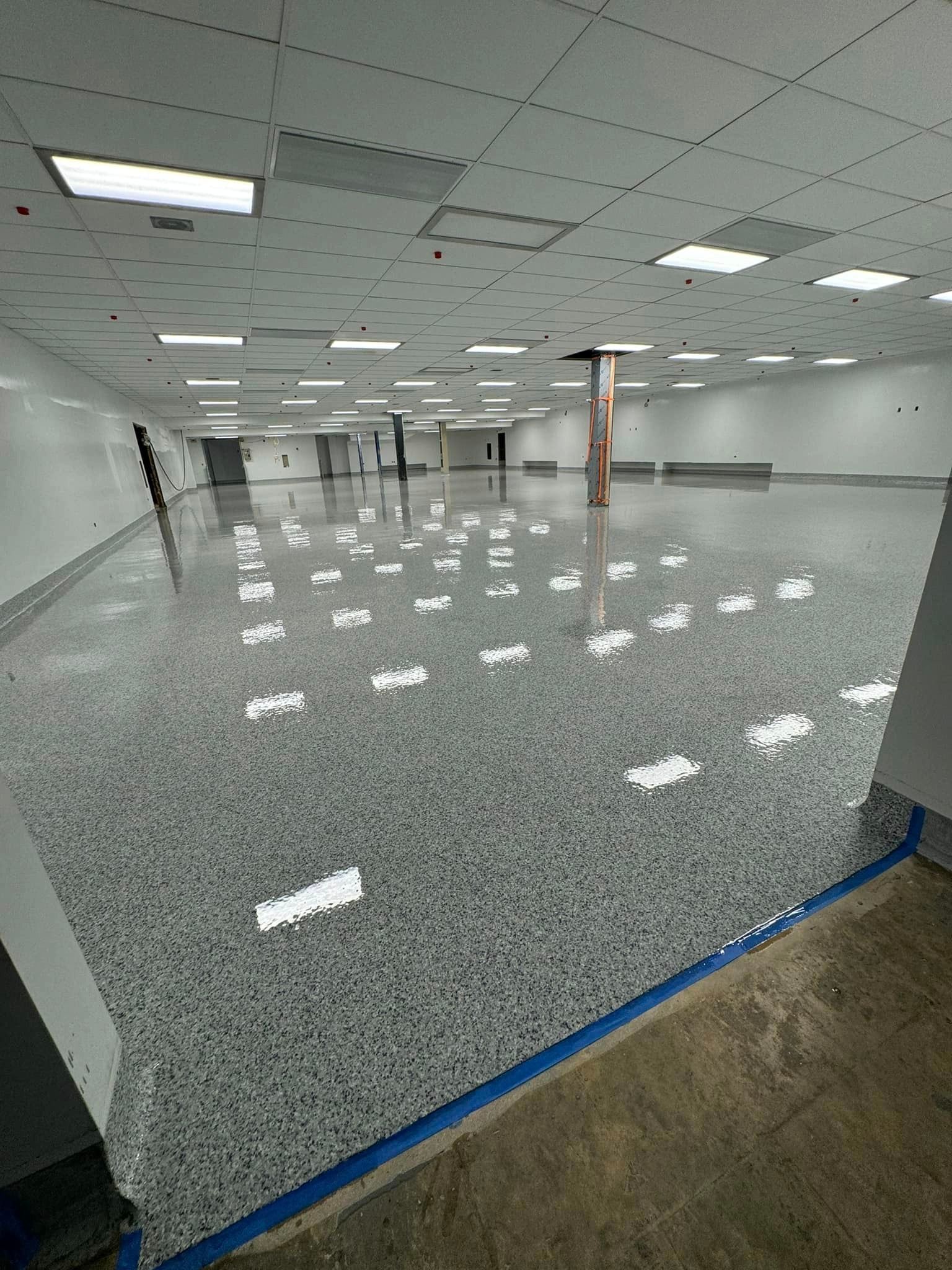 Flake epoxy flooring.