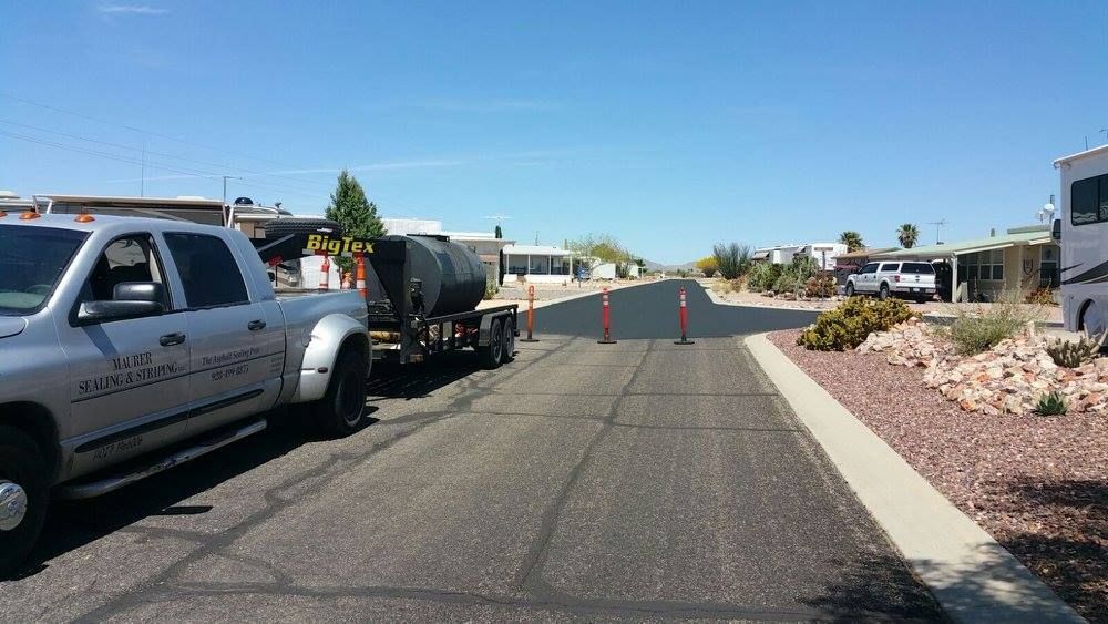 Truck Pouring Asphalt on the Road — Prescott, AZ — Maurer Sealing & Striping