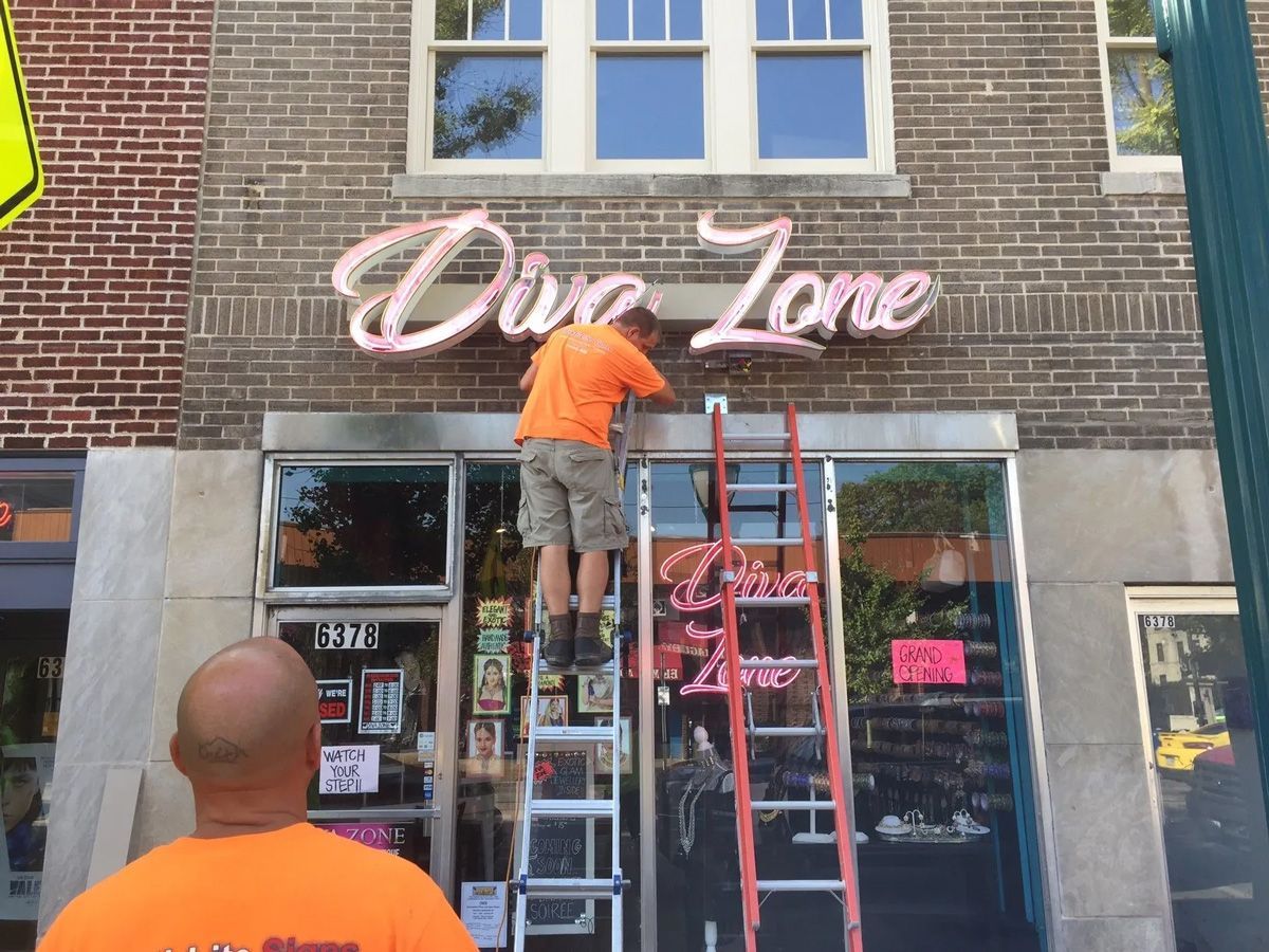 Exterior Neon Sign Installation — St. Louis, MO — Plasti-Lite Signs Exterior Neon Sign Installation — St. Louis, MO — Plasti-Lite Signs