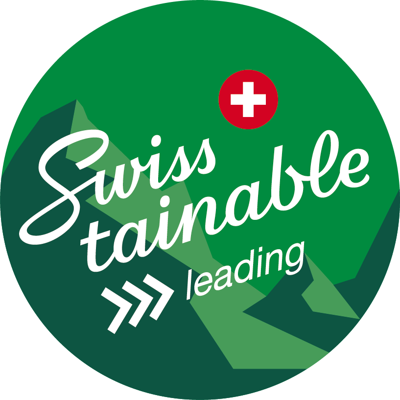 Ein grüner Kreis mit der Aufschrift „swiss tainable leading“