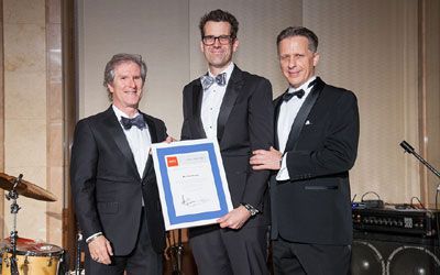 ACCJ Leader of the Year, Felix Busch on stage receiving his award at the 2016 Champagne Ball.