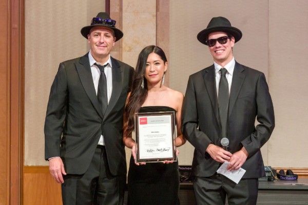 Nao Geisler - ACCJ Chubu Leader of the Year - receiving her award on stage