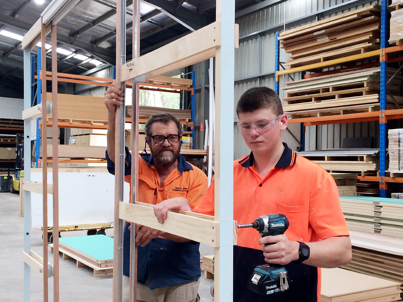Two Men Building a Door Frame - Door Specialist in Wauchope, NSW