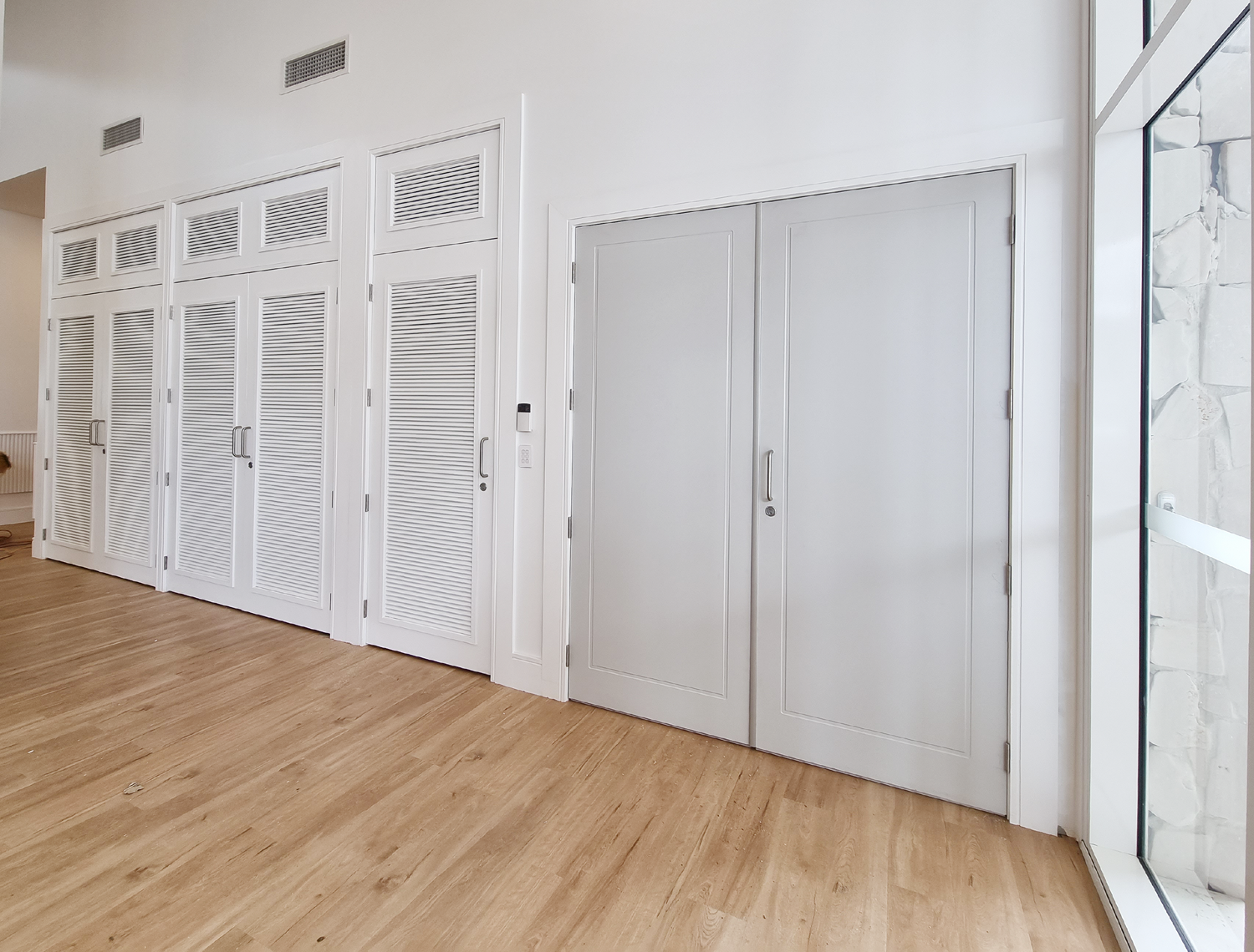 Image showing main foyer doors and storage area doors at Palm Lake Forster resort.