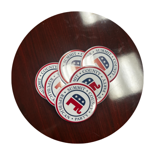 A stack of Summit County Republican Party stickers with a red, white, and blue design.