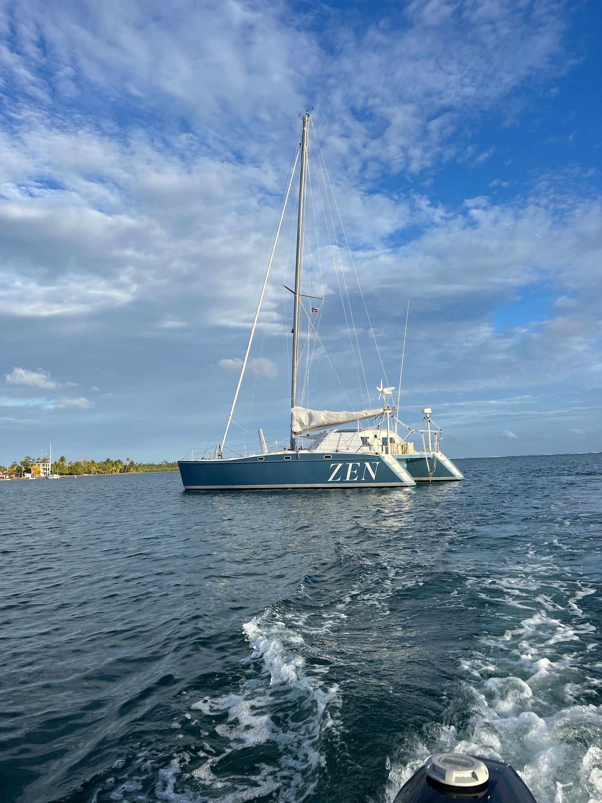 Chris White performance sailing catamaran Atlantic 48 ZEN private listing Rhode Island sitting in water on anchor