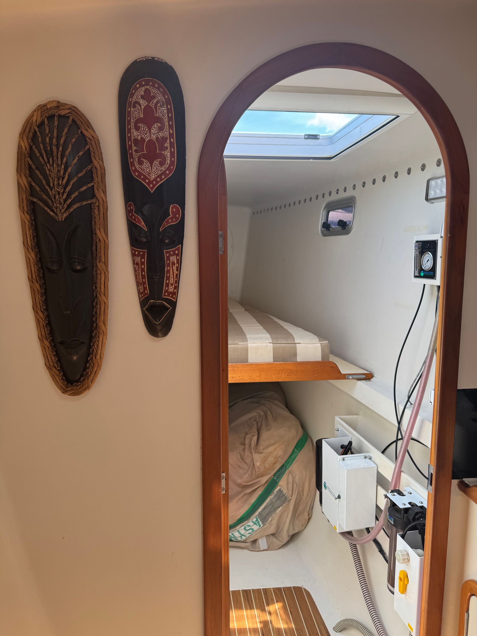 Chris White performance sailing catamaran Atlantic 48 ZEN private listing Rhode Island forward single berth and watermaker Spectra