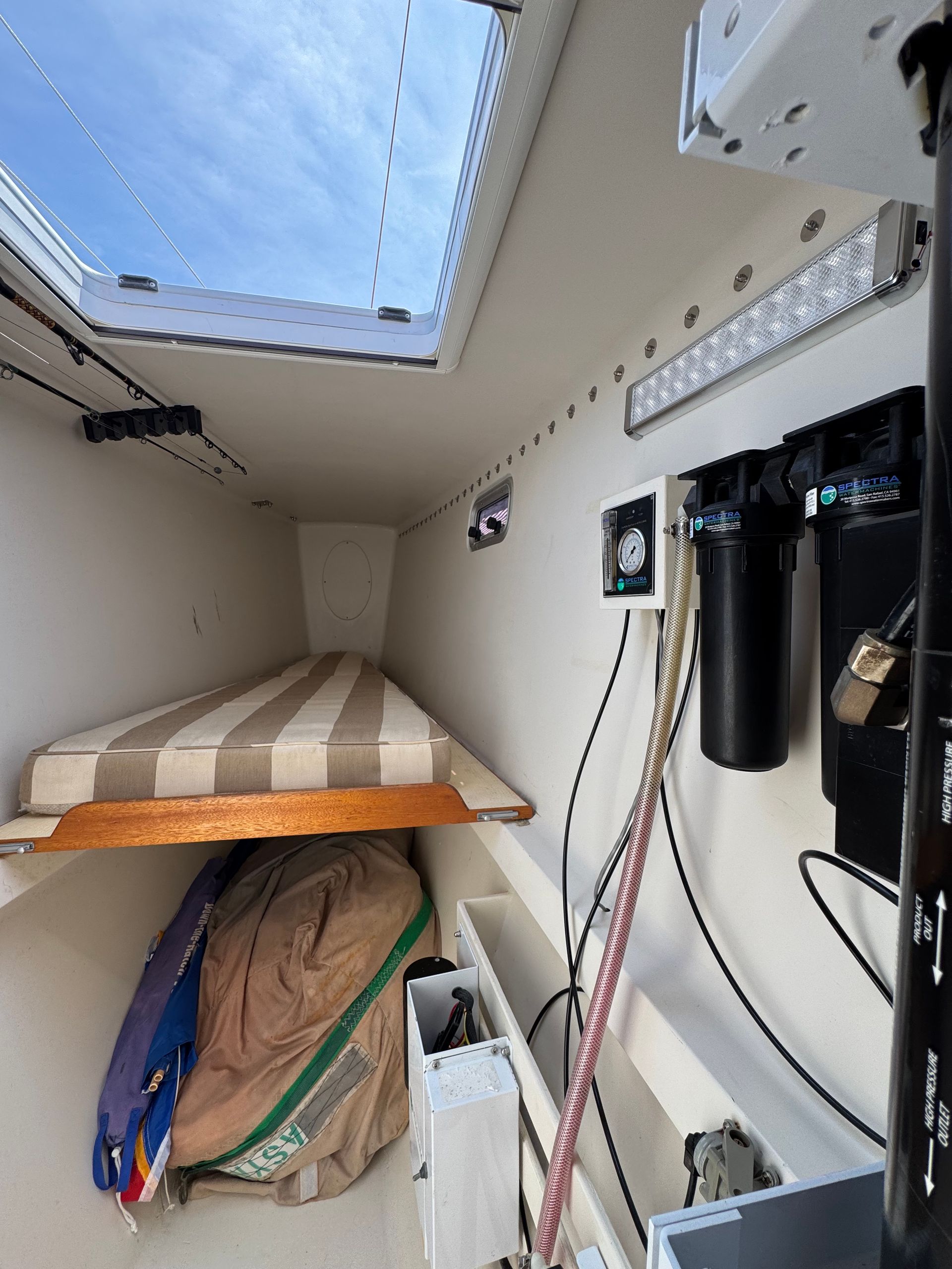 Chris White performance sailing catamaran Atlantic 48 ZEN private listing Rhode Island forward single berth and watermaker Spectra