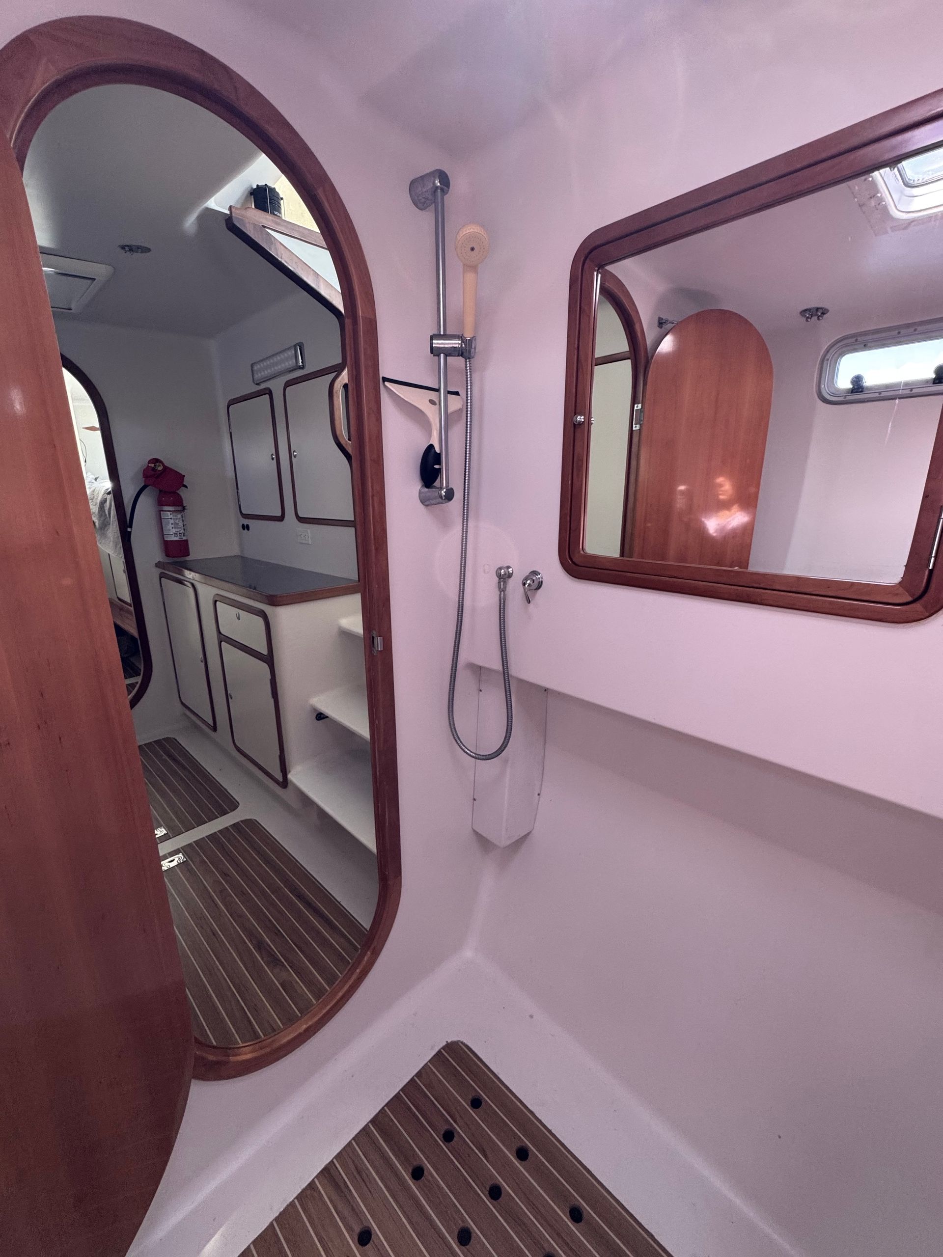 Chris White performance sailing catamaran Atlantic 48 ZEN private listing Rhode Island port walk-in shower