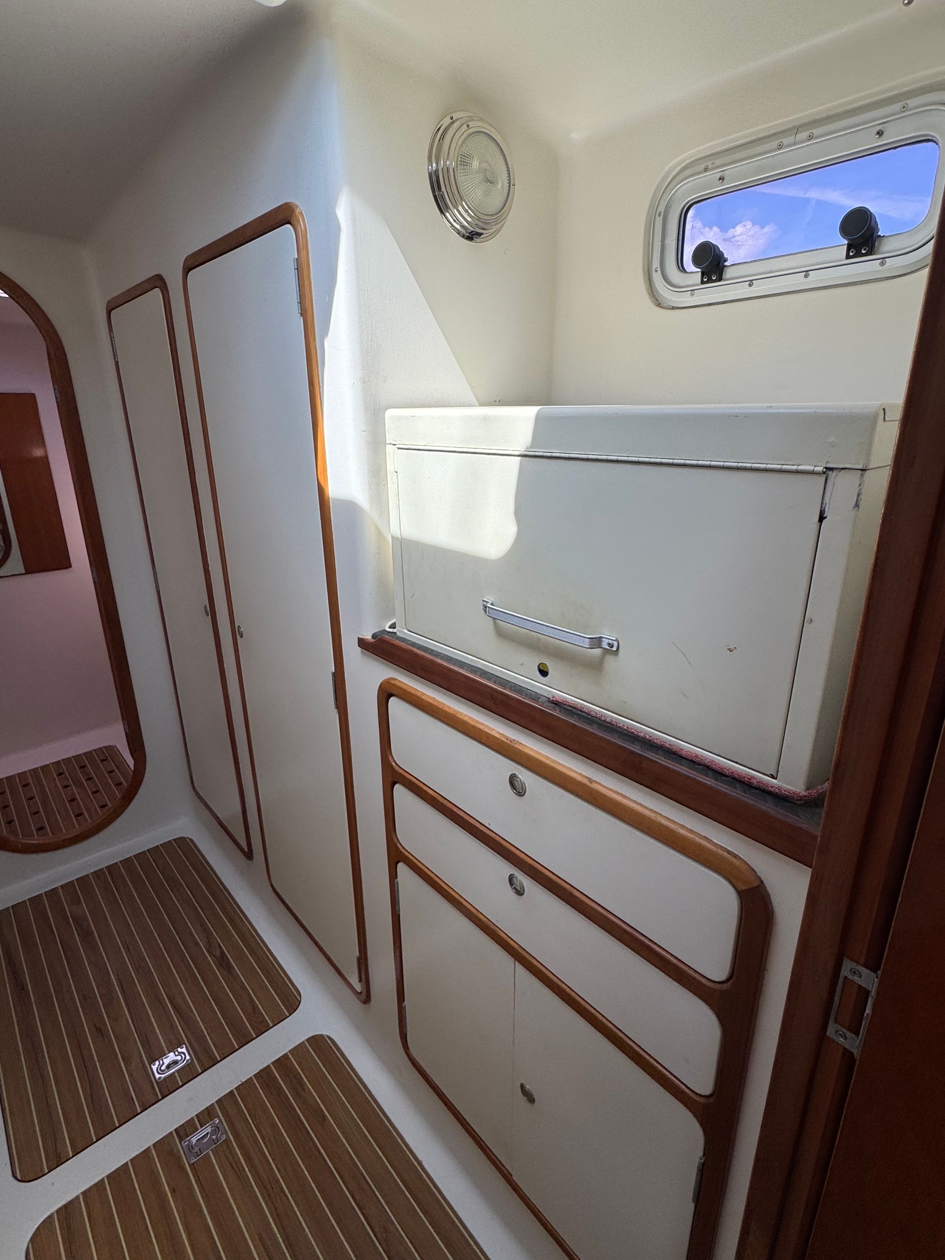 Chris White performance sailing catamaran Atlantic 48 ZEN private listing Rhode Island port workroom stainless steel, storage and stainless steel work bench