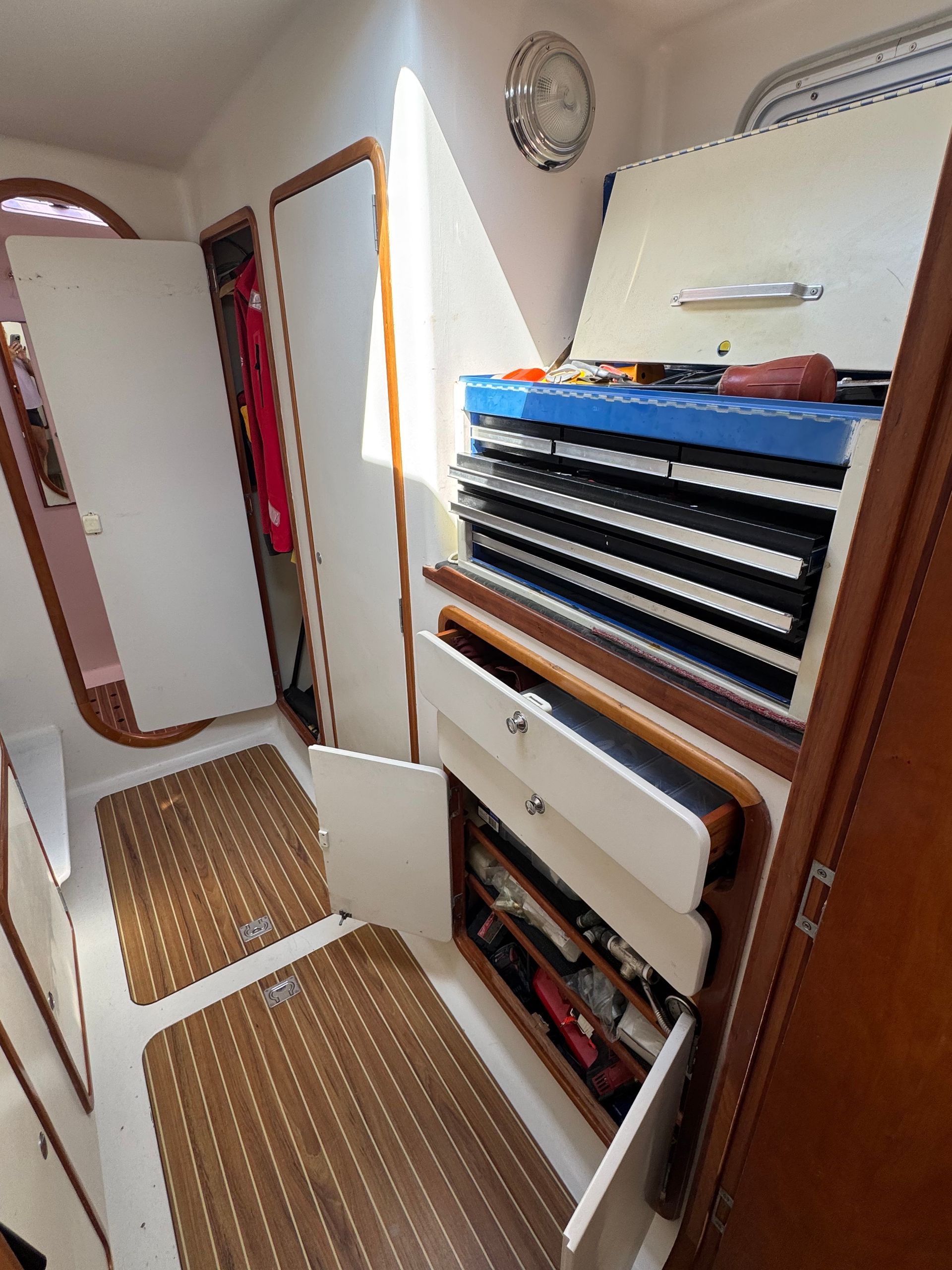Chris White performance sailing catamaran Atlantic 48 ZEN private listing Rhode Island port workroom stainless steel, storage and stainless steel work bench tool management