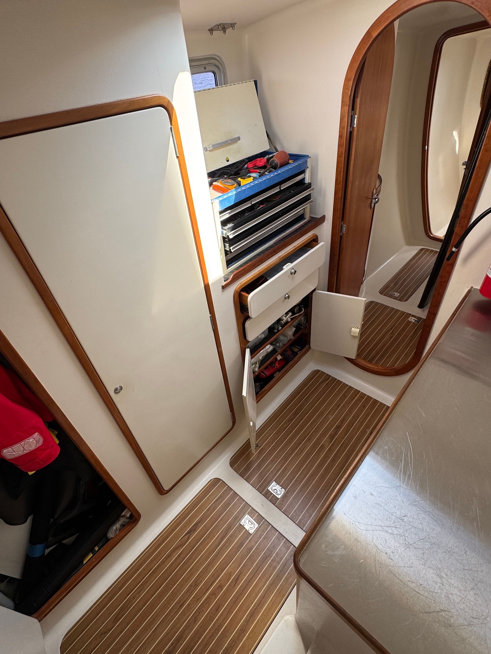 Chris White performance sailing catamaran Atlantic 48 ZEN private listing Rhode Island port workroom stainless steel, storage and stainless steel work bench