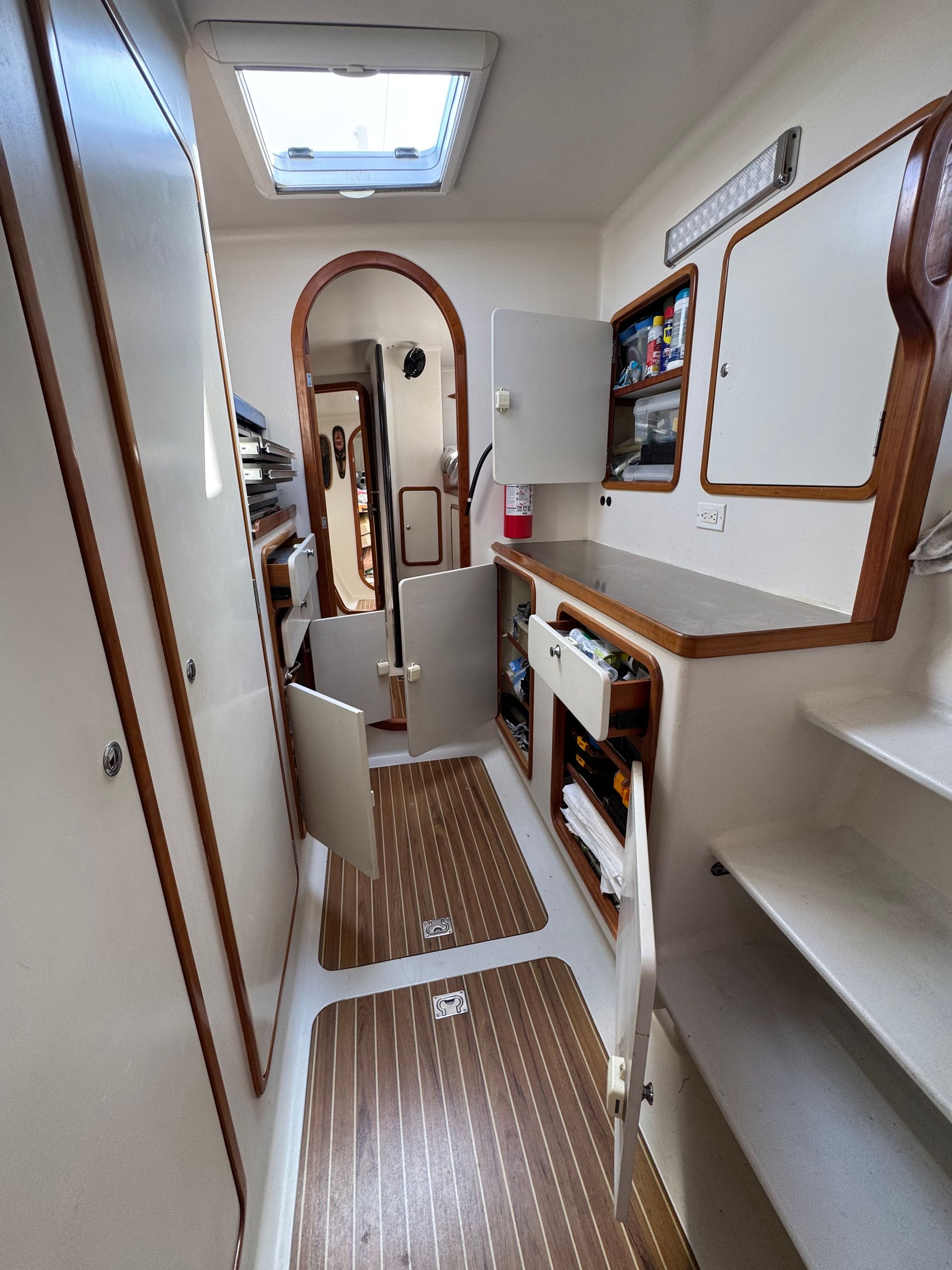 Chris White performance sailing catamaran Atlantic 48 ZEN private listing Rhode Island port workroom stainless steel, storage and stainless steel work bench
