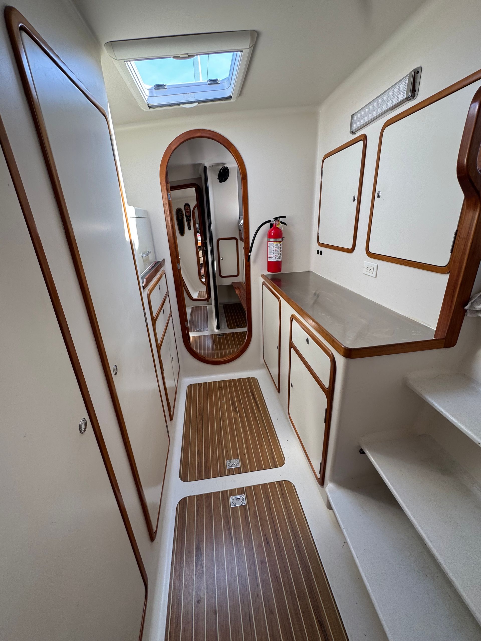 Chris White performance sailing catamaran Atlantic 48 ZEN private listing Rhode Island port workroom stainless steel, storage and stainless steel work bench