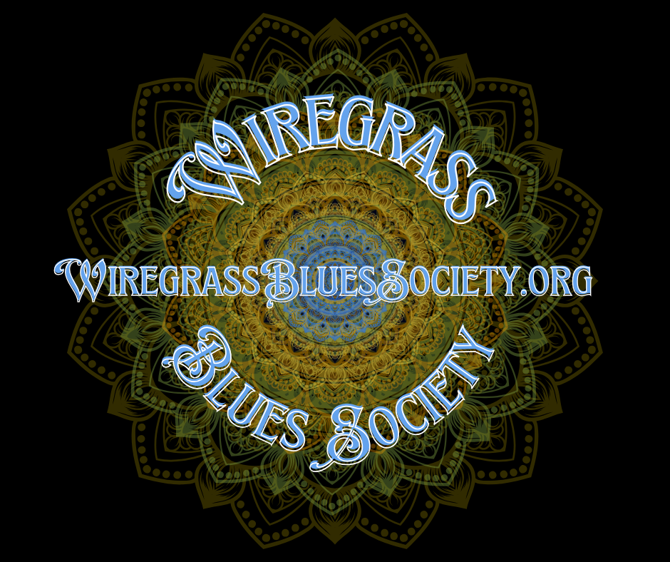 Logo for Wiregrass Blues Society. Text in light blue over a circular floral design. Website address visible.