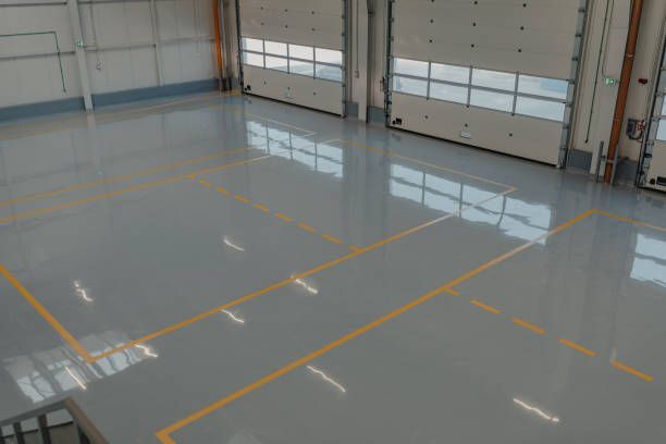 Commercial epoxy installation for large garage.  Light gray epoxy with shine. 