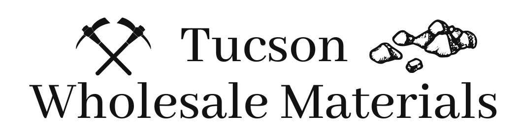 Tucson Wholesale Materials logo with crossed pickaxes and rocks in black and gray
