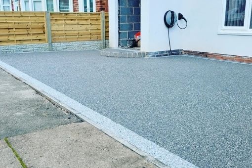 DNA Driveways Coventry - grey resin driveway in Coventry with light grey resin edging