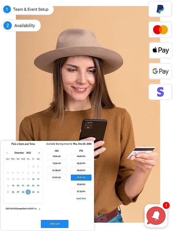 A woman in a hat is holding a credit card and a cell phone.