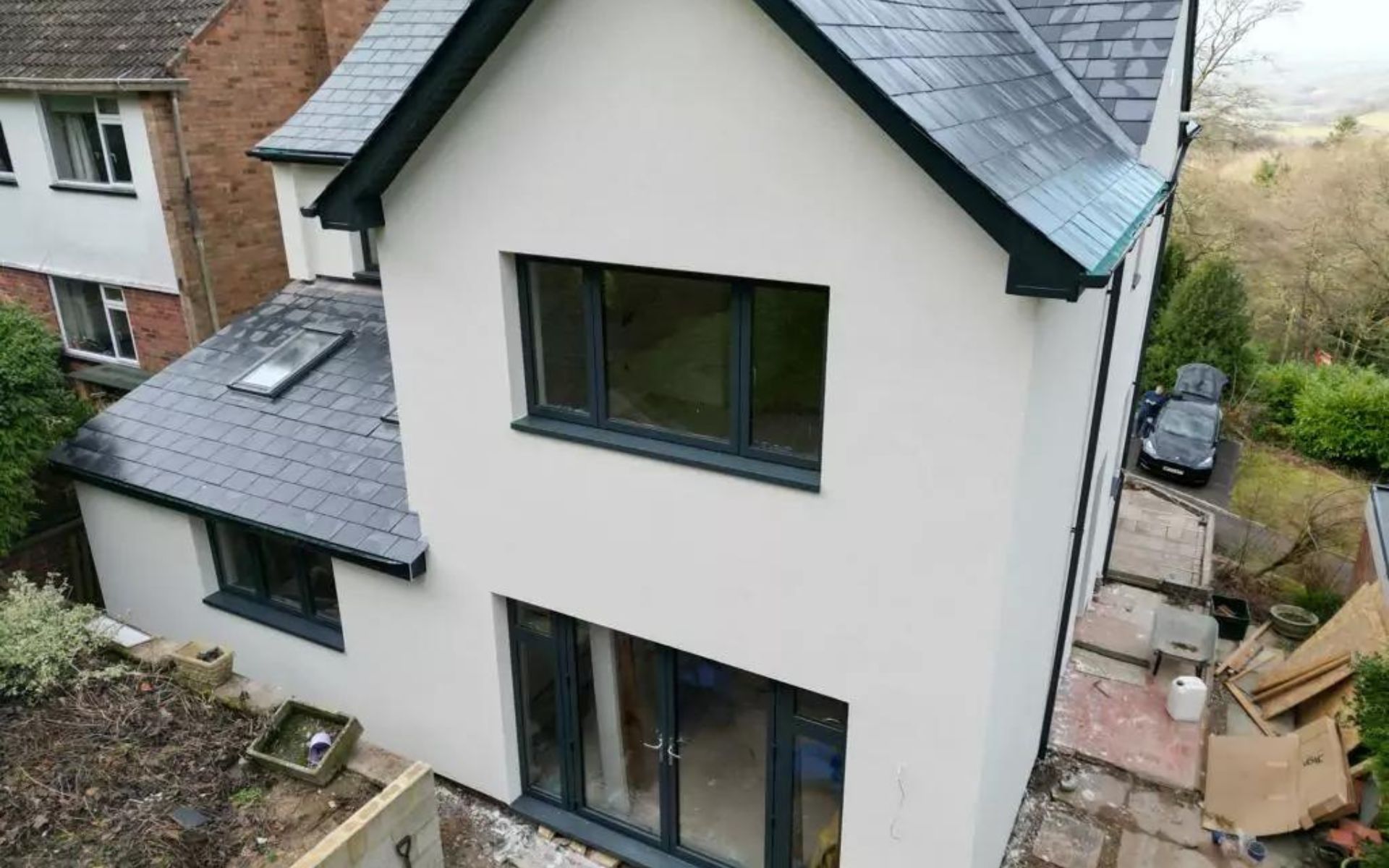 an aerial view of a house with a slate roof .