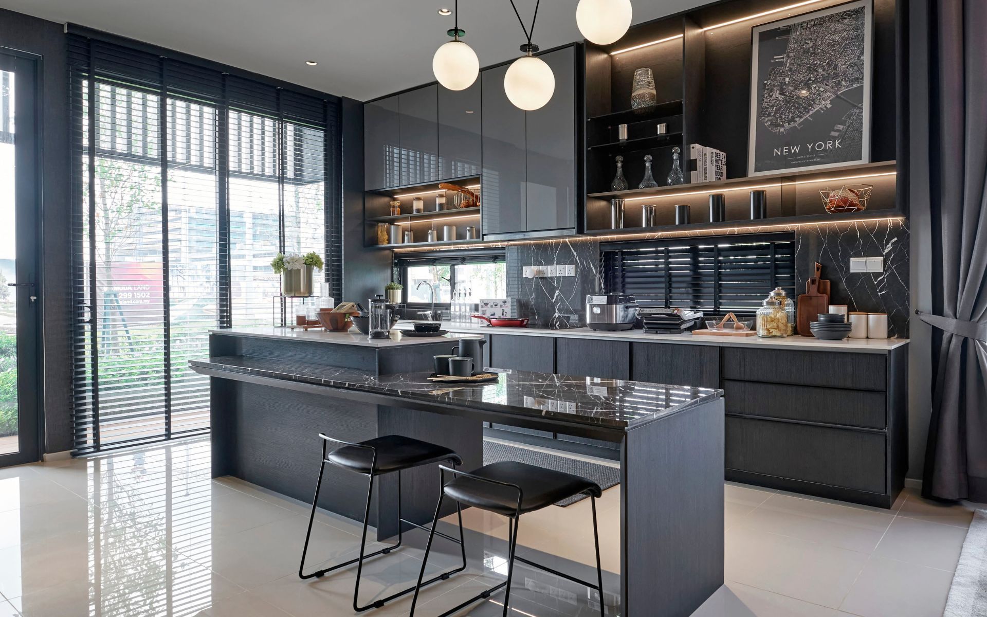 a modern kitchen with a large island and stools .