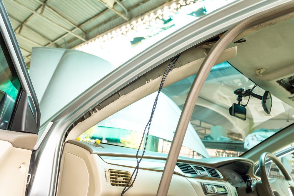 Car Interior With Deployed Side Curtain and Dashcam — Chris's Automotive & Marine Electrics In Marlow Lagoon, NT