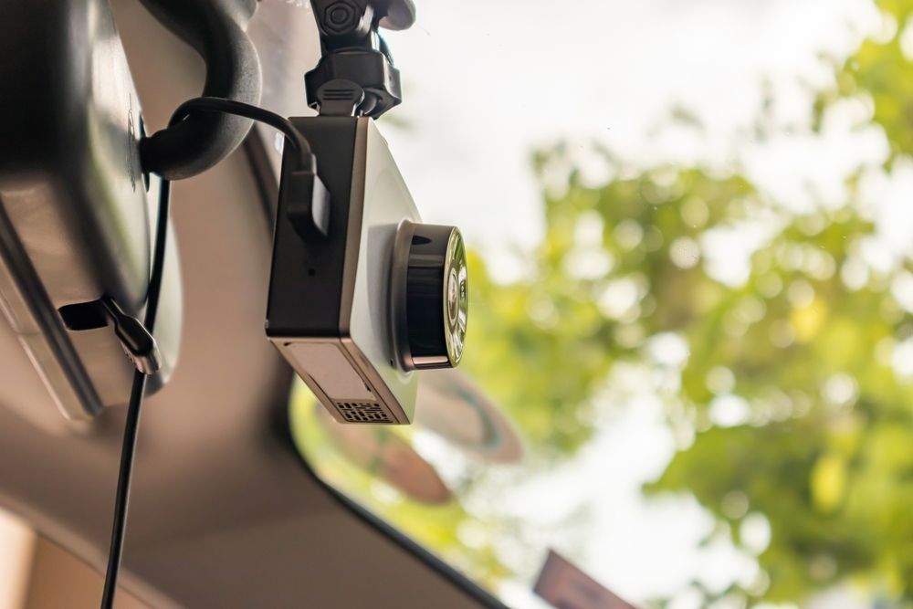 Compact Action Camera Mounted Outdoors Near a Building — Chris's Automotive & Marine Electrics In Marlow Lagoon, NT