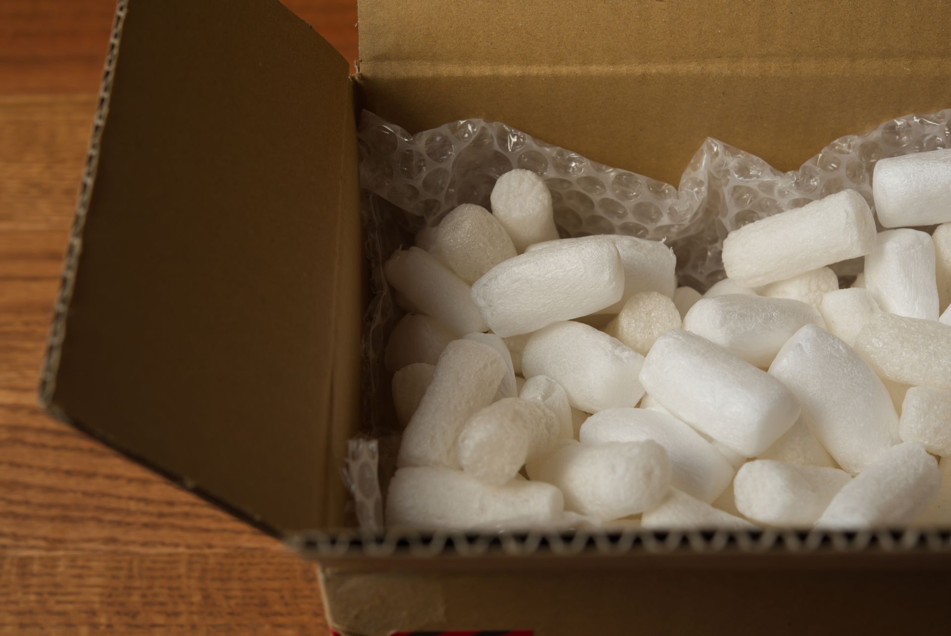 Packing peanuts in a box. Packing peanuts in a box.